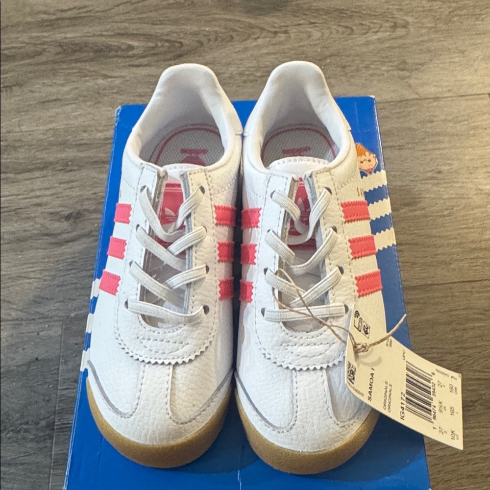 Brand new Adidas White Sneakers with Pink Accents